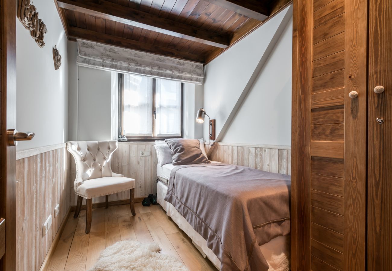 Precioso dormitorio del apartamento vacacional Marmotes by Totiaran, a pie de pistas