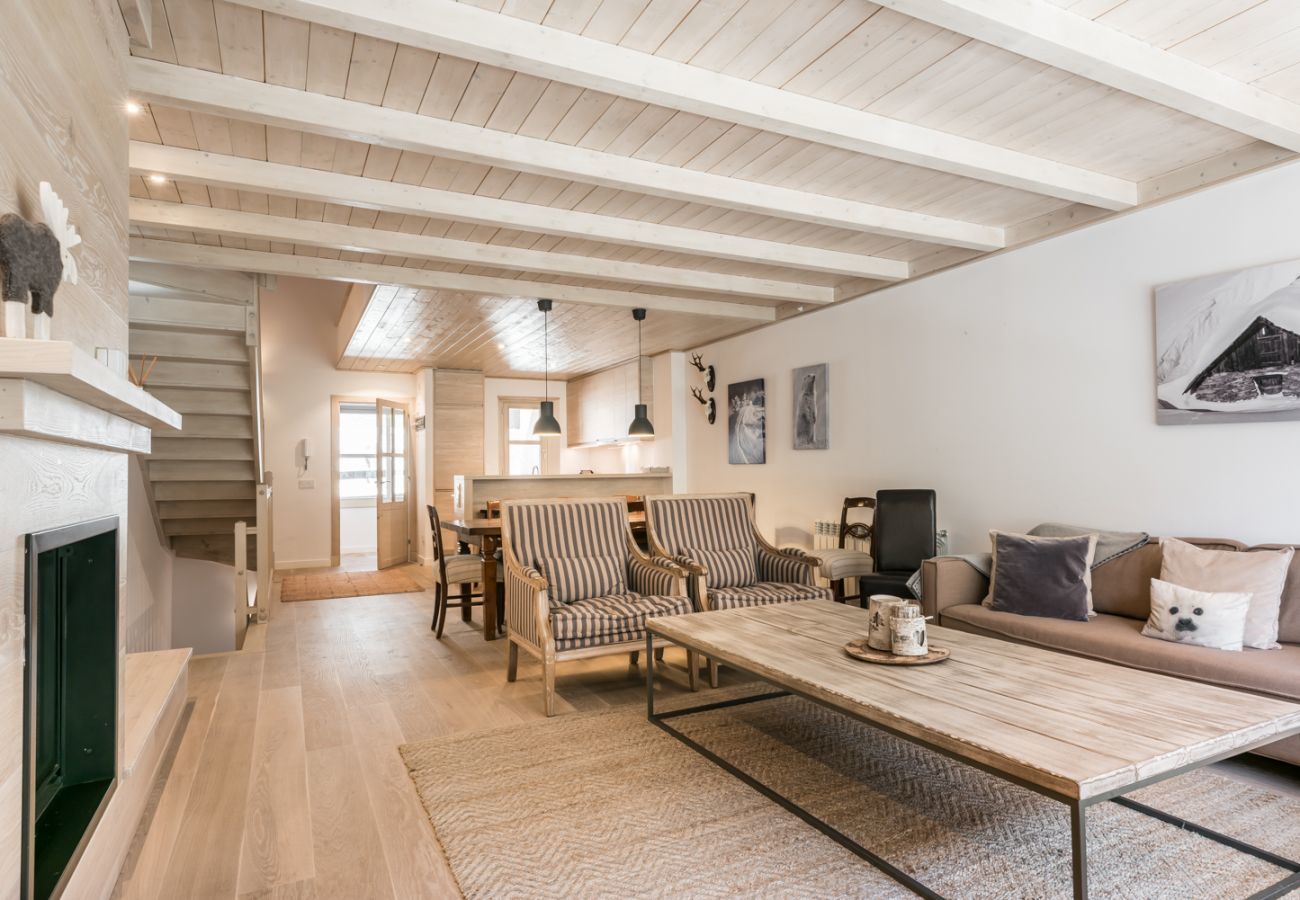 Living room of the Eth Mur by Totiaran house, Val de Ruda Urbanization, at the foot of the slopes